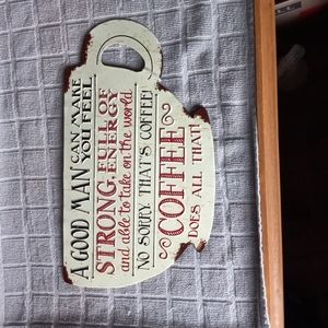 Distressed A Good Man coffee sign.